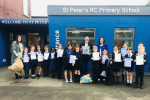 Chris and Students at St Peter's RC Primary School